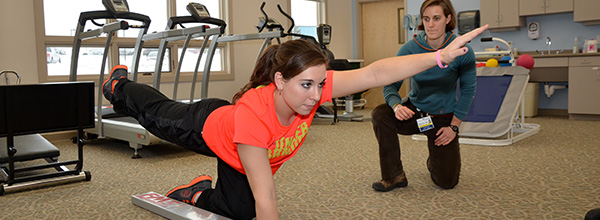 Physical Therapist working with client