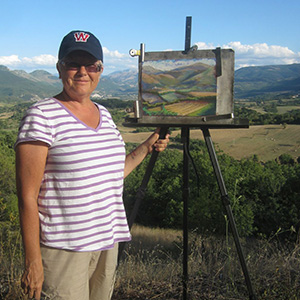 Jeneane Lunn painting in Italy last summer.