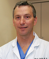 Mark E. Crane, MD