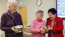 Wanda Baril recently presented Marilyn White, left, and Joni Argenti, center, with the 2015 CVMC Auxilian of the Year award